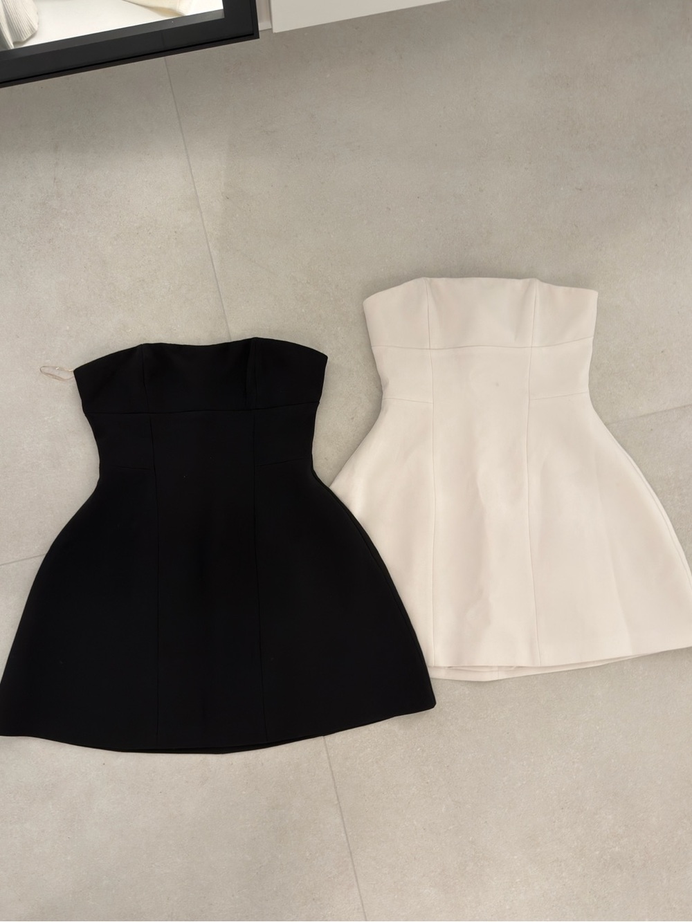 Bundle two Babyboo white and black tailored strapless dresses